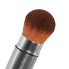 Close up image of the Otis Batterbee retractable powder brush. This powder brush is perfect for travel and placing inside your handbag. Also forms part of our travel makeup brush set.