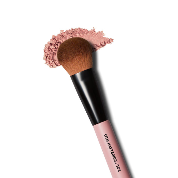 Meet the Otis Batterbee Blusher Brush, your must-have for seamless bronzer and blusher application. Designed for versatility, it flawlessly blends liquid blush for a natural glow and sweeps on bronzer for a sun-kissed look. Elevate your makeup game effortlessly.