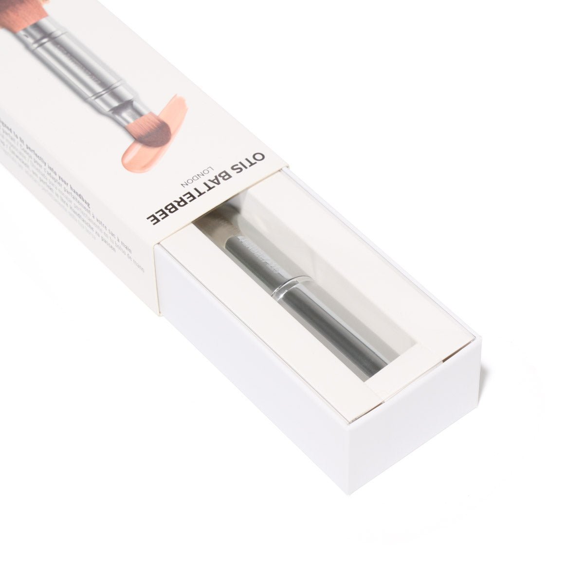 Retractable Silver Powder and Foundation Brush By Otis Batterbee.