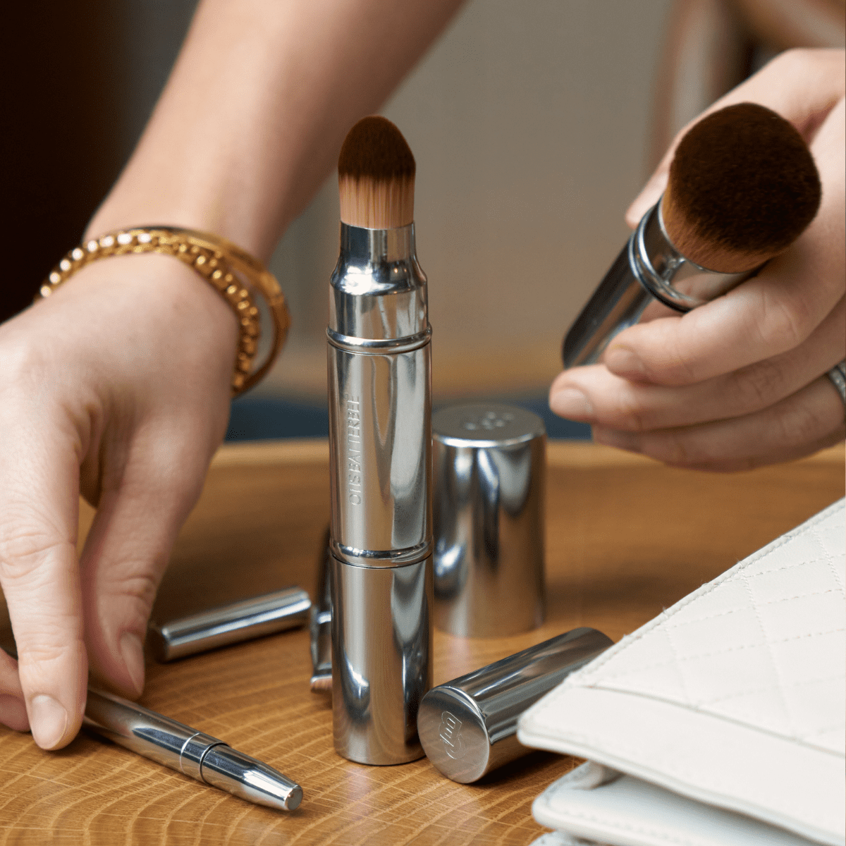 Retractable powder makeup brush by Otis Batterbee.