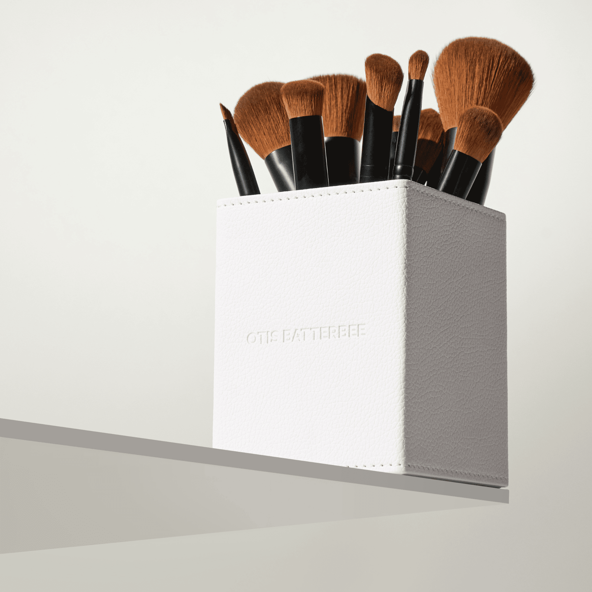 The 119 Brush: "This is the ultimate flat foundation buffer brush. Use to blend your foundation for flawless look. Also this brush is perfect for blending liquid blusher over your cheeks."
The 103 Brush: "This is the perfect brush for detailed foundation application. The tapered head and denser bristles work in your foundation around the nose and jawline.
The 102 Brush: "It&