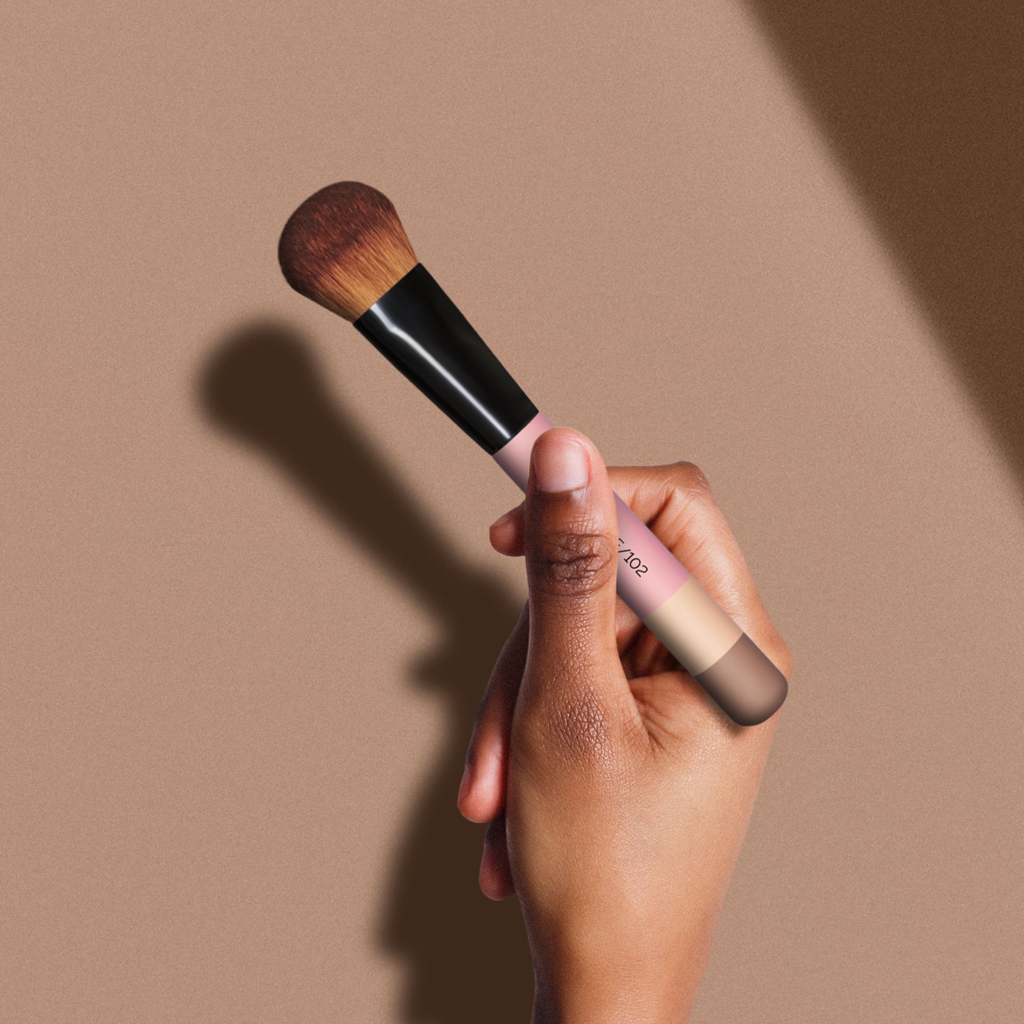 Otis Batterbee Blusher Makeup Brush - A sleek, luxurious blusher brush with a minimalistic design, featuring premium bristles and an ergonomic handle for precise and versatile makeup application.