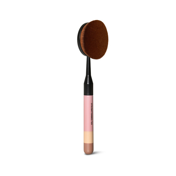Achieve flawless foundation application with the Otis Batterbee Oval Foundation Buffer Makeup Brush. Designed for precision, its densely packed bristles effortlessly blend liquid or cream formulas for a seamless finish. Elevate your makeup routine with this essential tool for achieving a flawless complexion effortlessly.