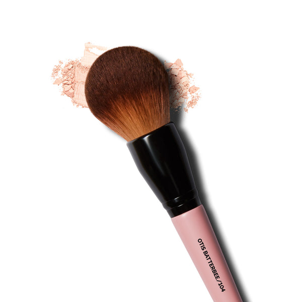 Discover perfection in powder application with the Otis Batterbee Extra Large Makeup Brush. Luxuriously designed for precision, its generous dome shape and plush bristles effortlessly provide seamless coverage and a flawless finish. Elevate your makeup routine with this essential tool for achieving a radiant complexion with ease.