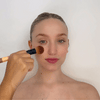 Watch the Otis Batterbee Blusher Brush in action, perfect for bronzer and blush application. Experience seamless beauty, packaged with precision.