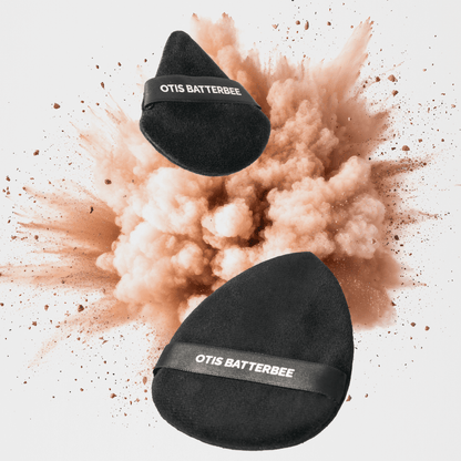 Powder puffs for setting loose powder over the face and body by Otis Batterbee.