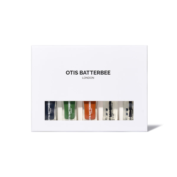 Deep coloured nail polishes by Otis Batterbee. The Nail Bar In A Box contains a burnt orange coloured nail polish, a dark indigo blue nail vanish and a sage green polish. Also included is a base nail coat, a top nail coat and crystal glass nail file.