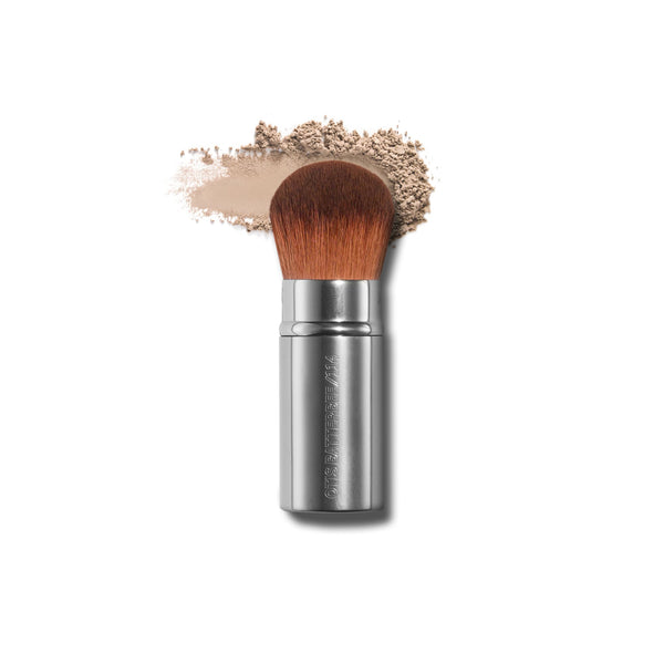 Retractable Kabuki Powder brush by Otis Batterbee. This retractable travel makeup brush is perfect for powder and bronzer products. Silver makeup brush.