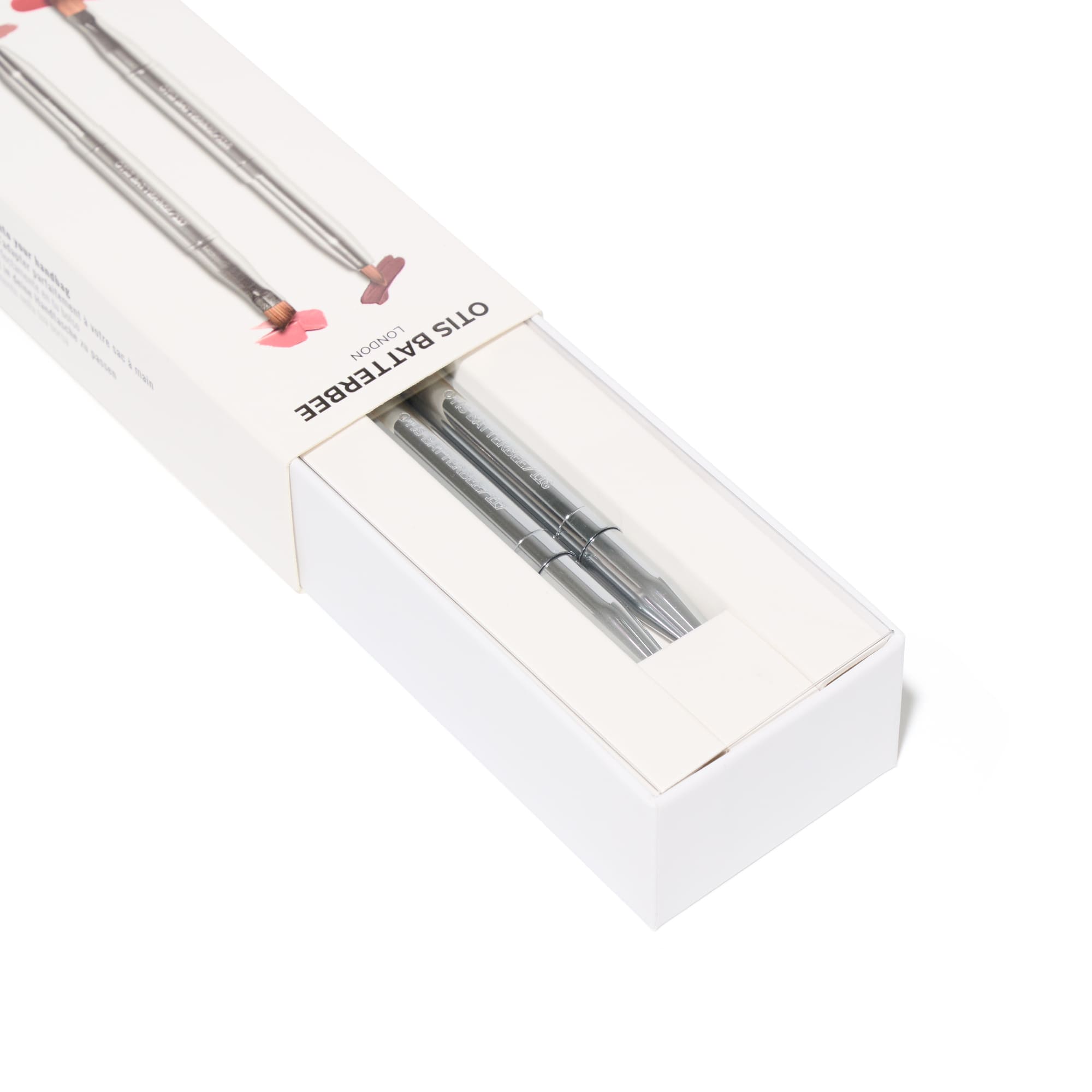 Silver pocket size makeup brushes by Otis Batterbee. Perfect for handbags and purses.